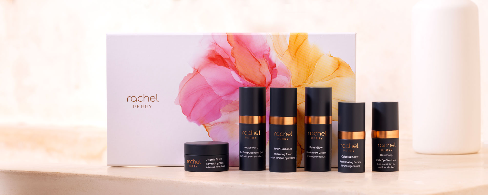 natural vegan skincare gift set box and travel size minis by rachel perry on a light background