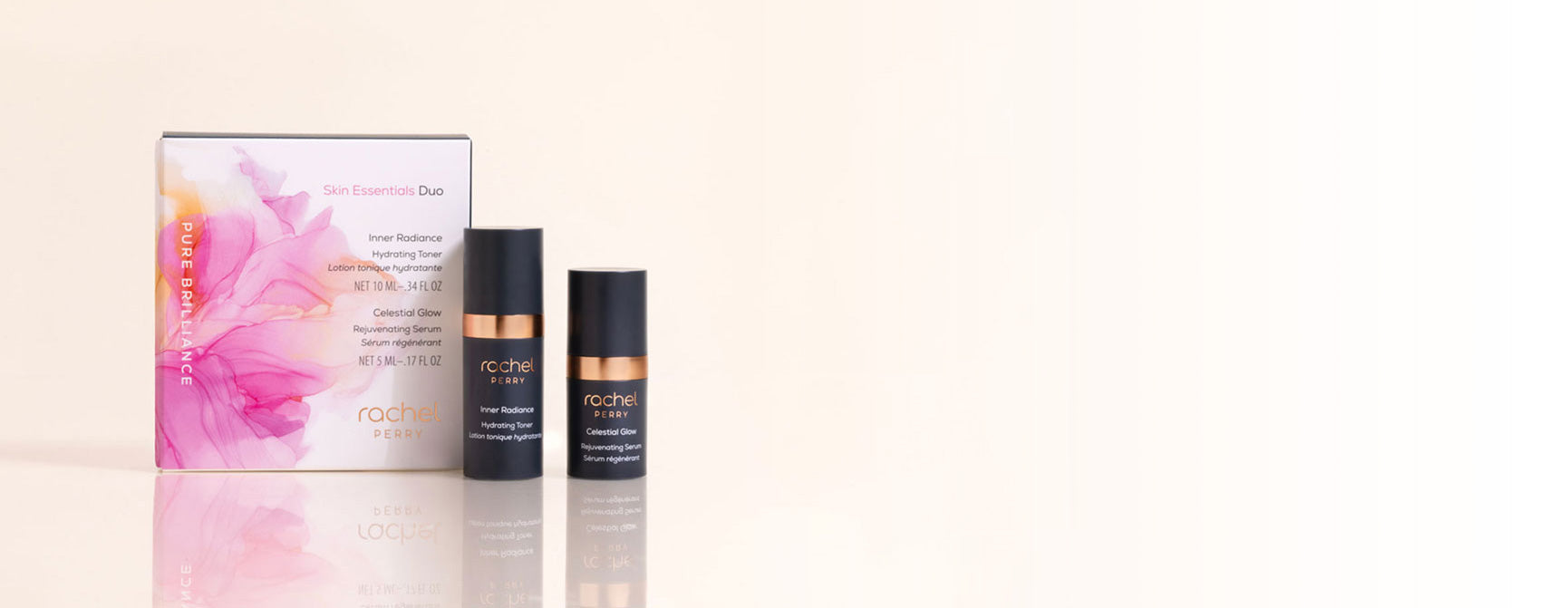 rachel perry all natural skincare products including a box and two bottles of all natural hydrating toner and serum on a light pink background